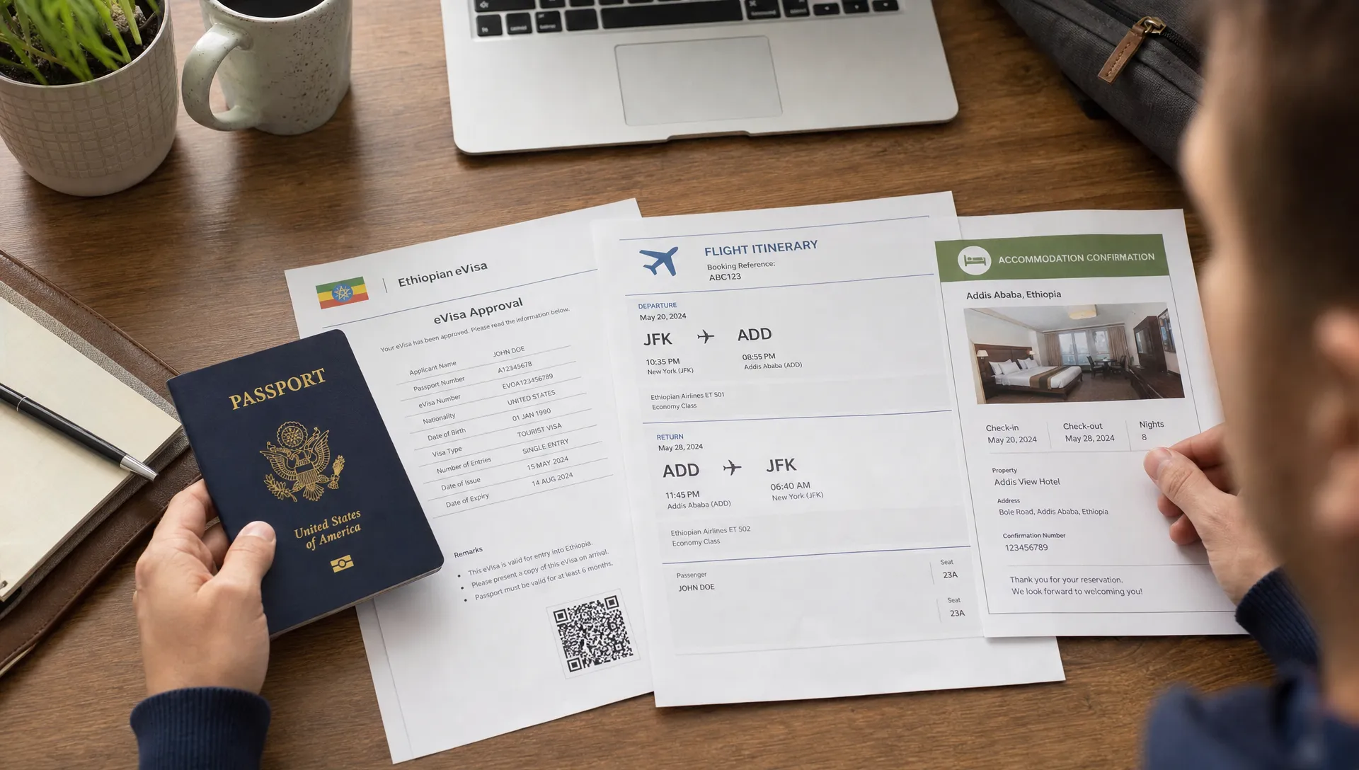 A traveler organizing a passport, printed eVisa approval, flight itinerary, and accommodation confirmation on a desk before an international trip to Ethiopia.